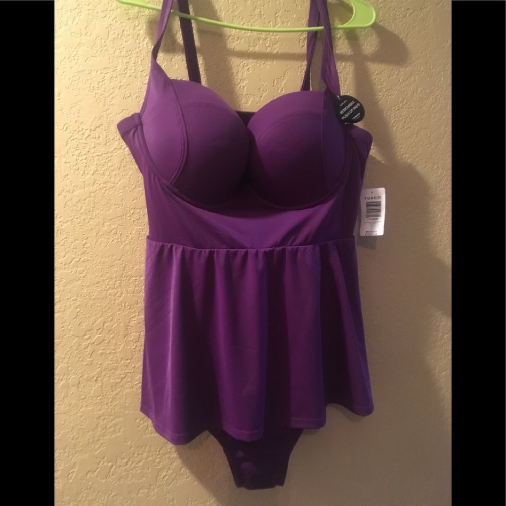 This size 1 purple daring swim suit size 1